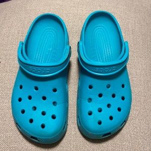 Turquoise Crocs women’s size 9